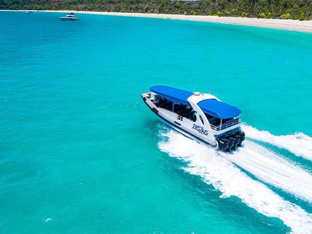 ZigZag Whitsundays Day Tour boat at Whitehaven Beach